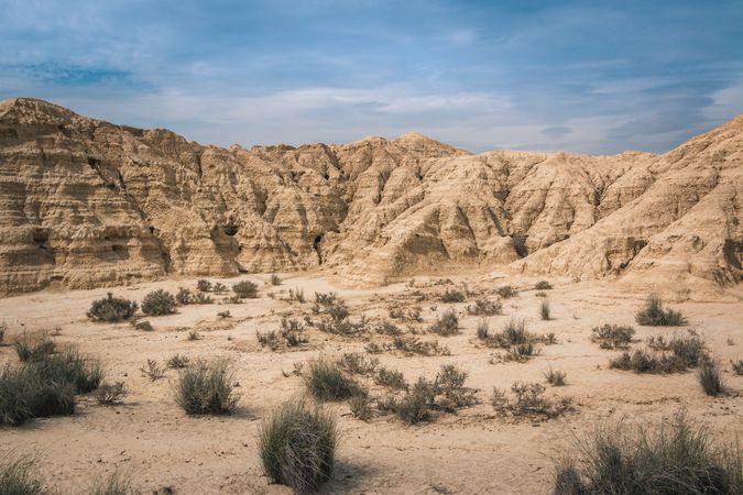 Amazing landscape of desert hills on background of blue sky