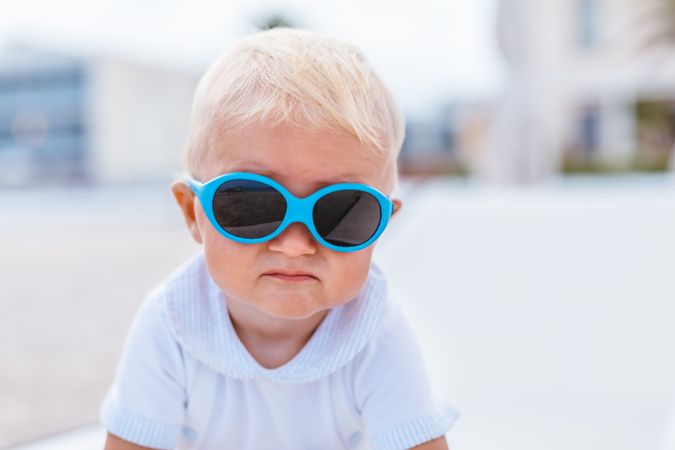 Blonde baby with sunglasses