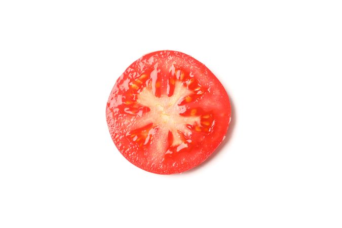 Slice of tasty tomato isolated on neutral background