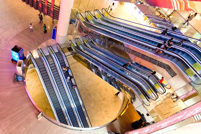 Looking down at nine escalators