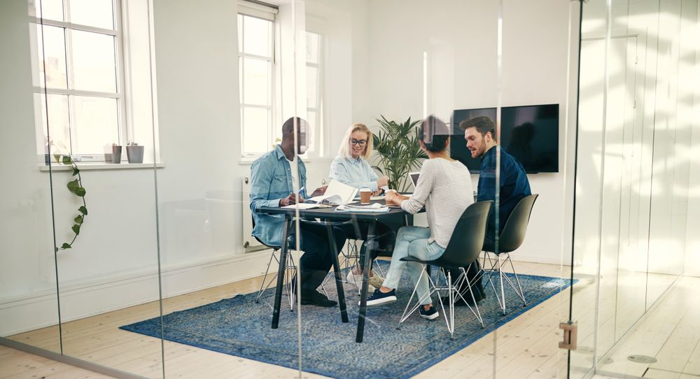 Multi-ethnic colleagues during a meeting in a modern office