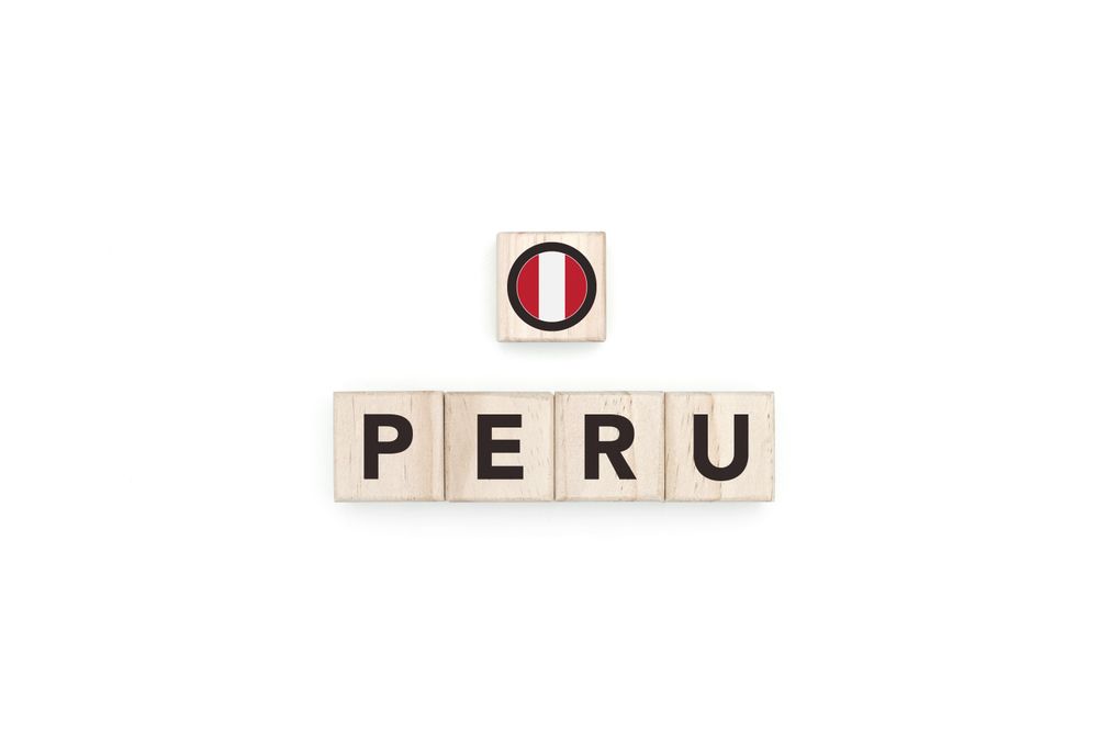 Wooden blocks bearing the name and flag of Peru.
