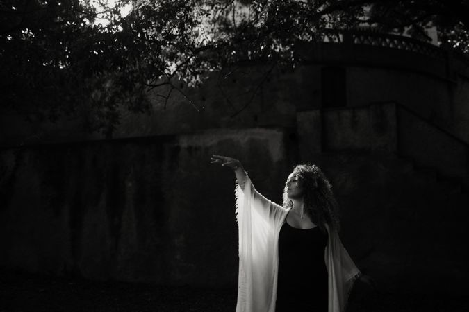 ethereal woman dancing in nature