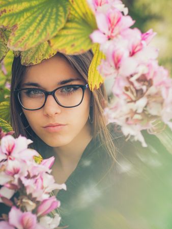 Woman on background of stunning violet flowers