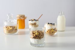 Tasty and nutritious breakfast concept - muesli with yogurt