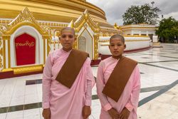 Mandalay, Myanmar - June, 25 2012: Monk boys in monastery yard