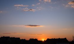 Orange and blue sky at sunset in France