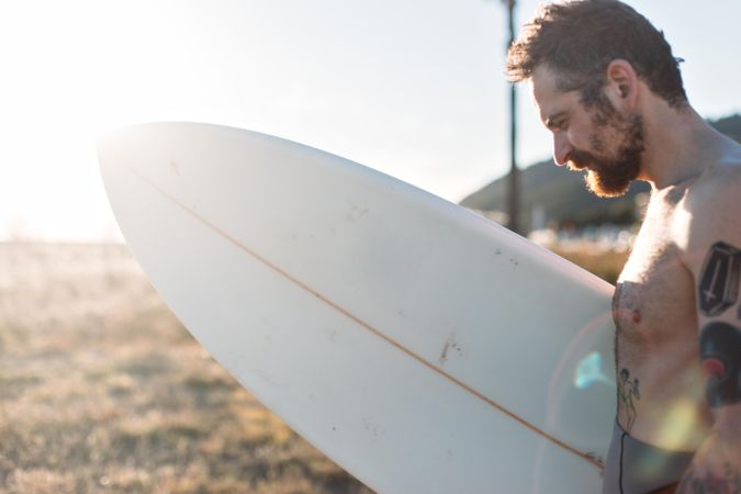 Soft focus close up shot focused on surfboard