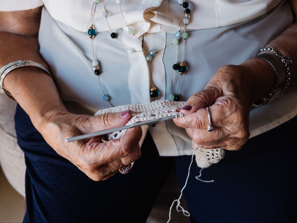 Mature woman knitting crochet