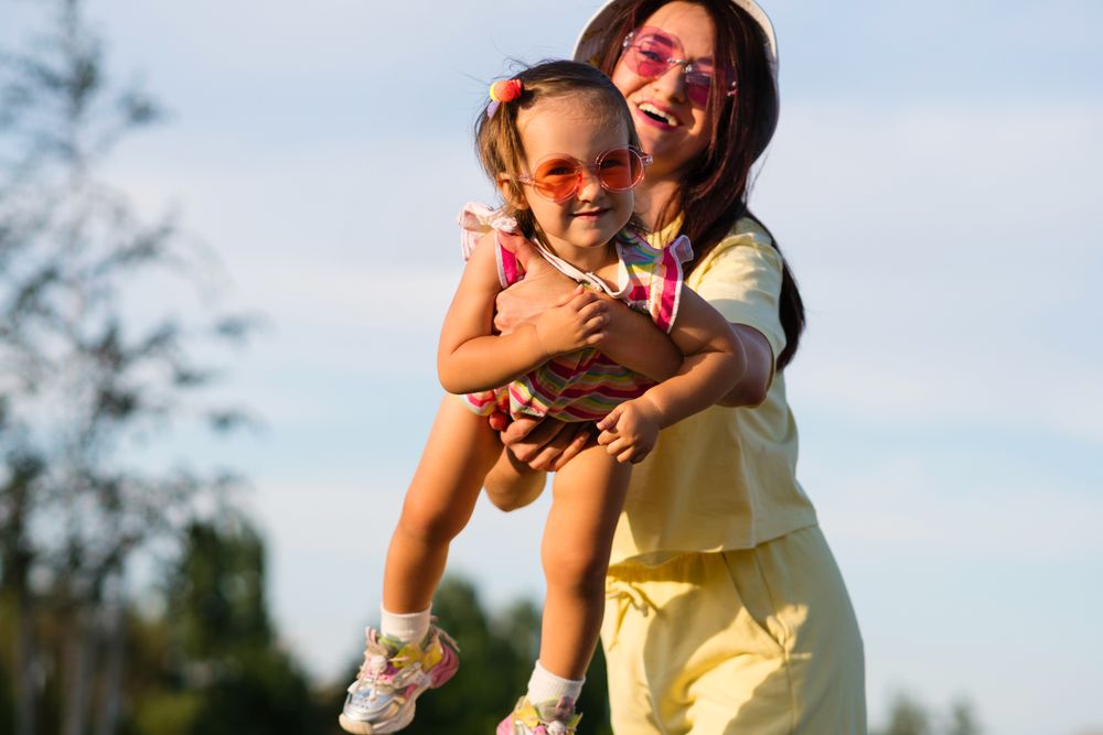 Mother holding toddler