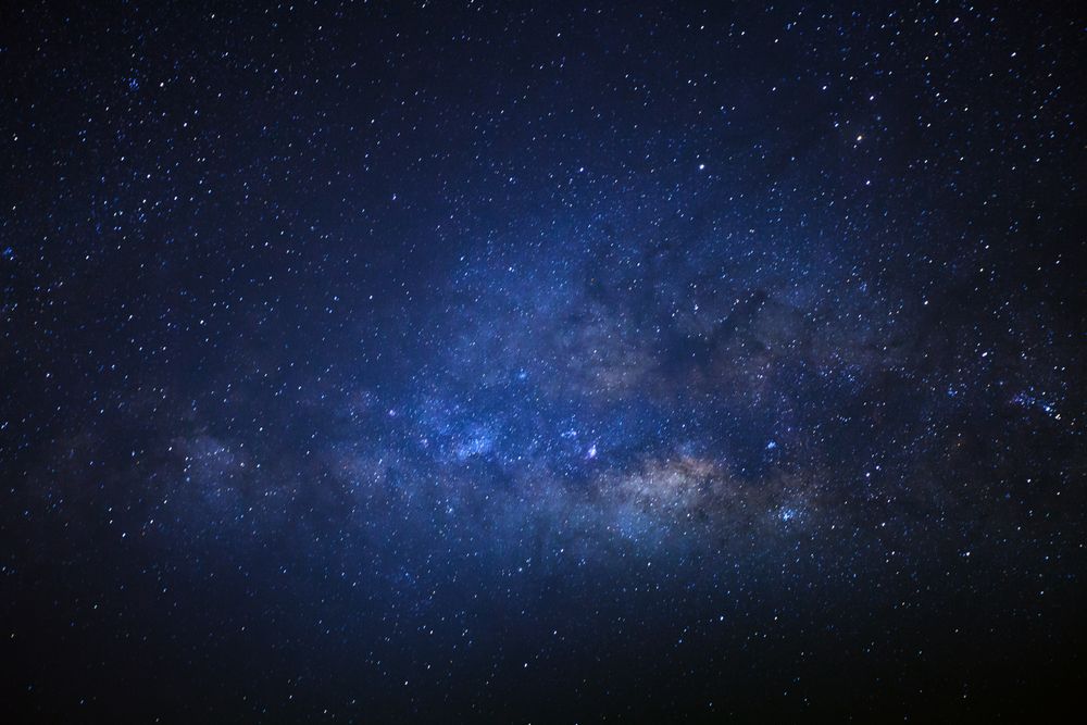 The center of the milky way galaxy with stars and space dust in the universe, Long exposure photograph, with grain