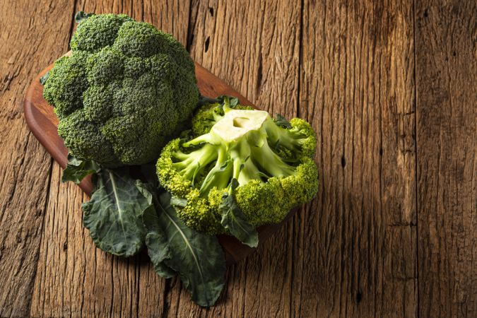 Green organic broccoli on the table.