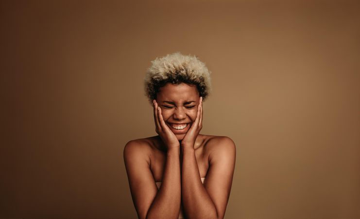 Portrait of excited Black woman
