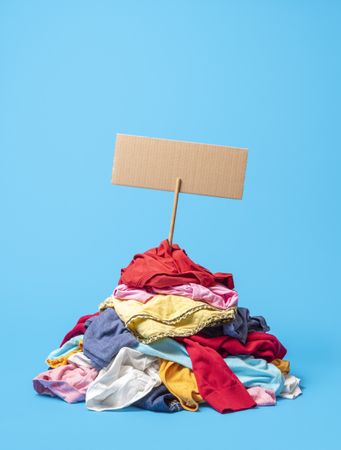 Clothes pile on a blue background