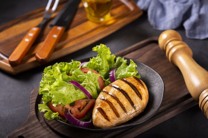 Tasty grilled chicken with salad.