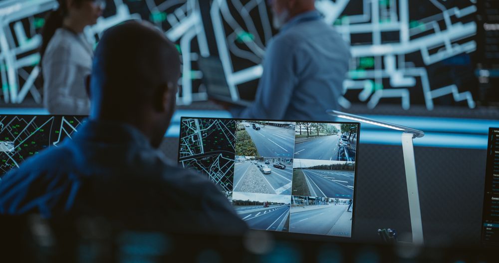 Black Technical Support Manager Using Computer for Solving an Issue for a Client
