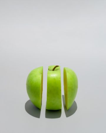 Apple cut in three peaces