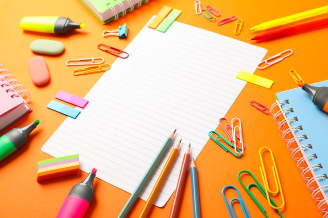 Composition with school supplies on color background, space for text