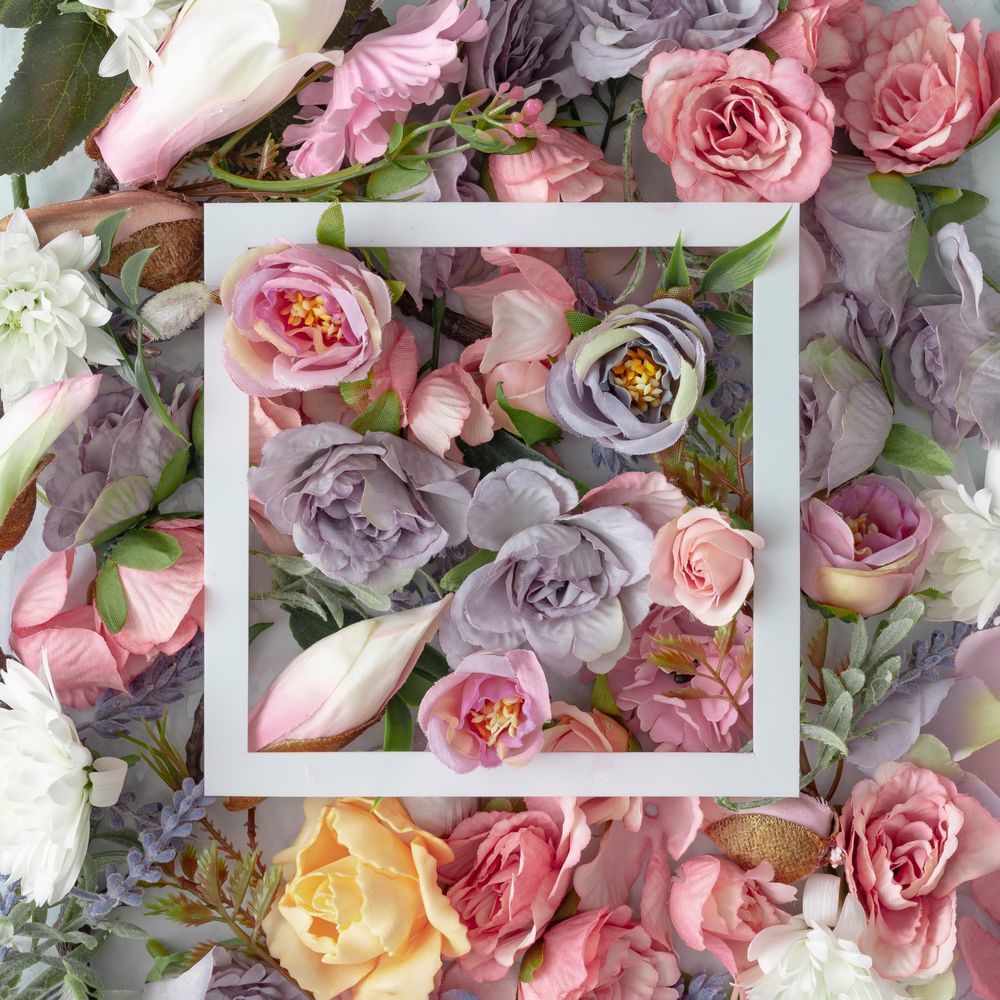 Easter composition made with flowers with ribbon copy space