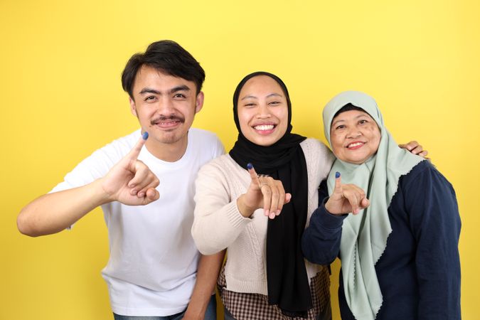 Three People Indonesian Family Showed Tinta Pemilu, Inked Finger