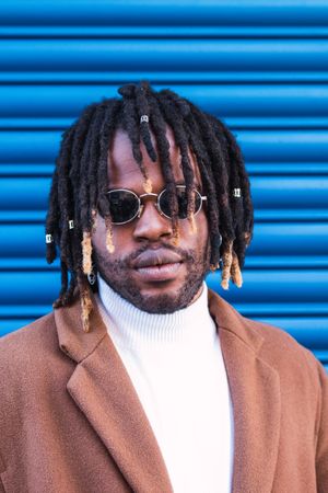 Black man in trendy sunglasses in city