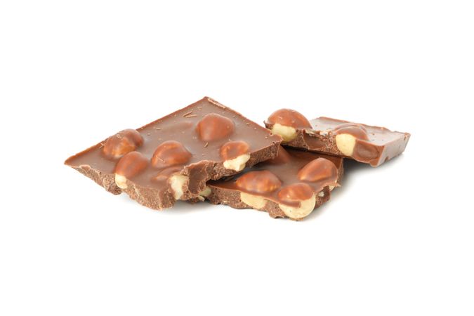Tasty chocolate pieces isolated on plain background