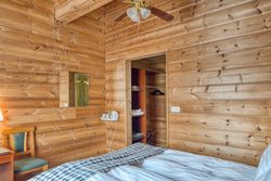 Comfortable hotel interior with wooden wall