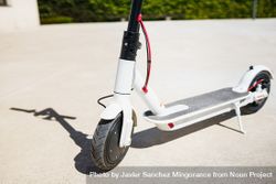 Close up of electric scooter parked in the sun 5o7e15