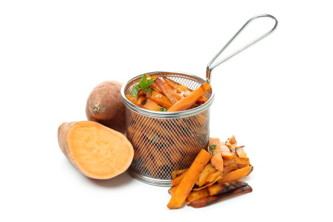 Fried sweet potato, isolated on light background