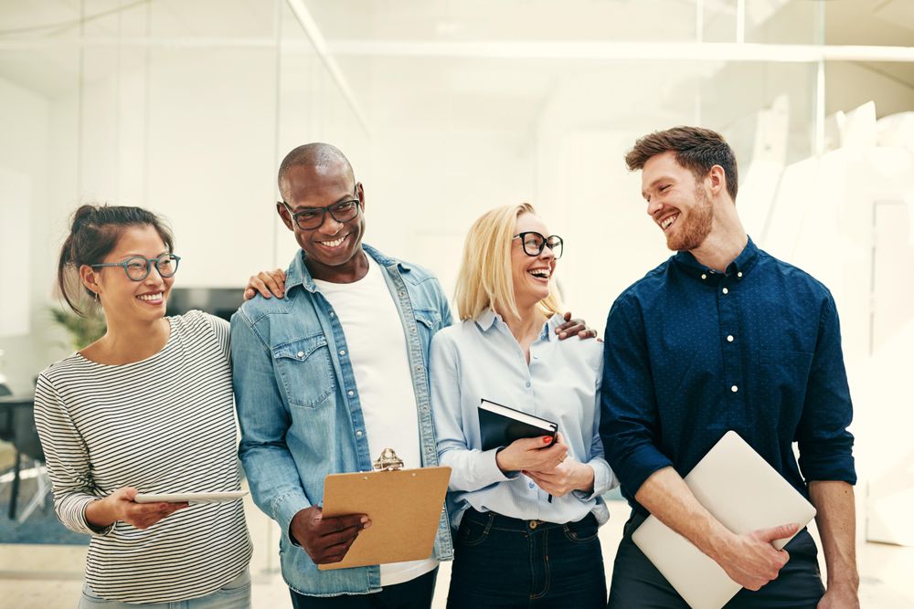 Multi-ethnic group of colleagues smiling together
