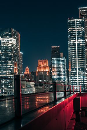 Lighted cityscape of skyscrapers at night