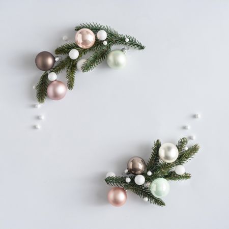 Modern Christmas wreath made of decorative baubles and branches