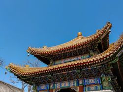 Chinese traditional architecture, adorned with intricate details and vibrant colors, showcasing the rich cultural heritage and craftsmanship