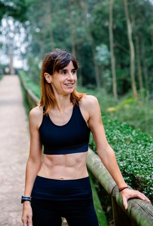 Tired athlete woman after a race