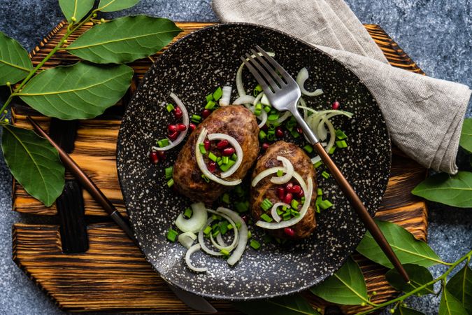Top view of two abkhazura cutlets served on plate