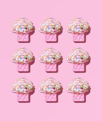 Cute muffin toys on pink background
