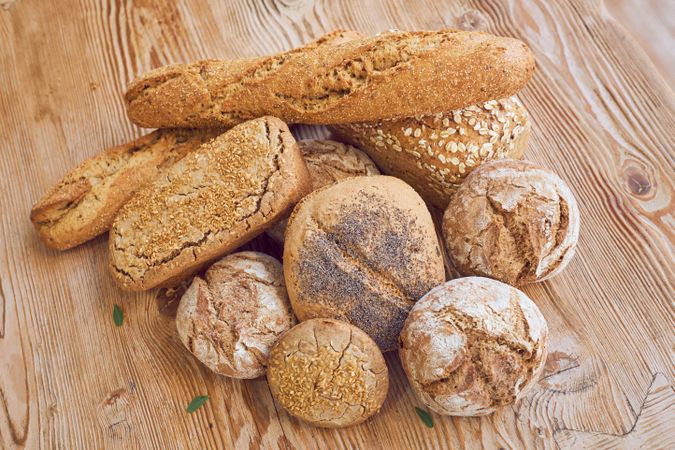 Pile of bread on wooden table