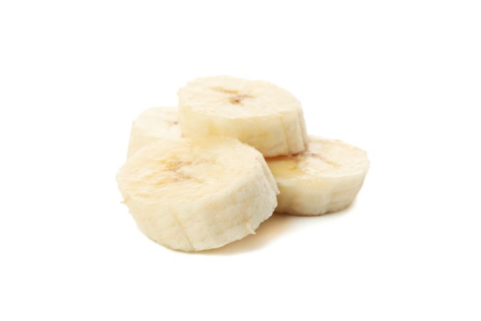 Banana slices isolated on blank background. Fresh fruit