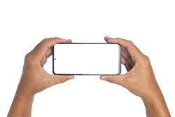 male hand holding smartphone horizontally with blank screen smartphone