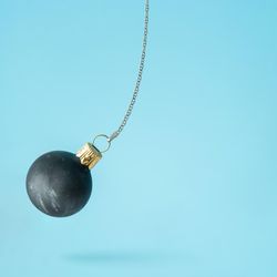 Swinging wrecking ball Christmas bauble decoration