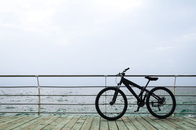 Sea view with bicycle, space for text