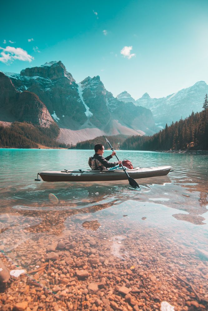 Man kayaking on a lake