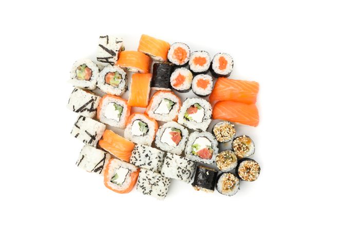 Japanese food. Delicious sushi rolls isolated on light background