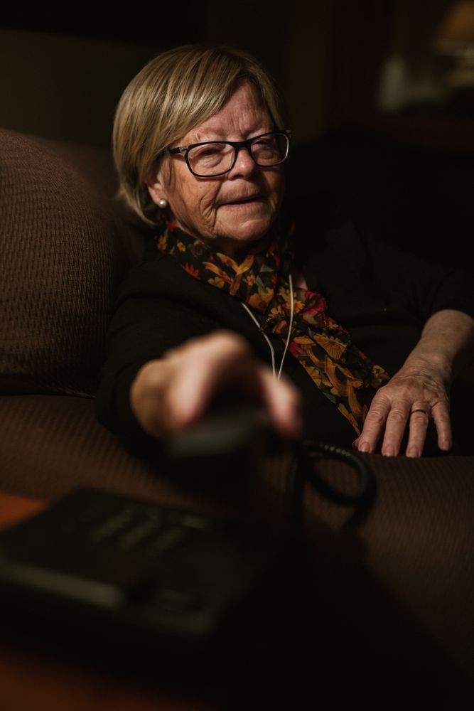 Older woman answering phone call