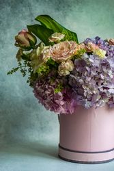 Fresh purple and pink pastel summer floral gift with roses