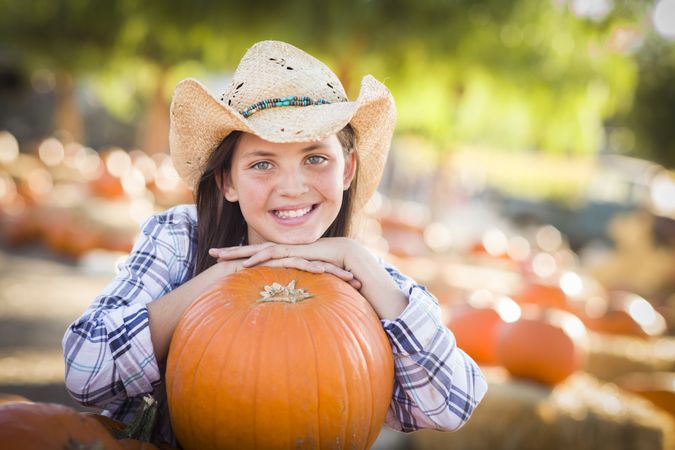 Preteen Girl Portrait at the Pumpkin Patch.