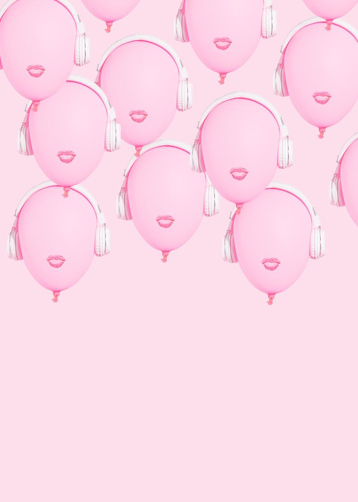Many pink balloons with lips wearing headphones with copy space