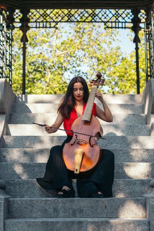 Woman musician playing cello