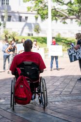 Los Angeles, CA, USA — June 16th, 2020: man listening to speaker at rally for racial justice