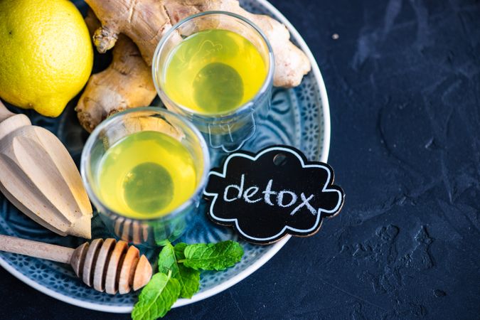 Detox drink with organic lemon, ginger and mint with copy space